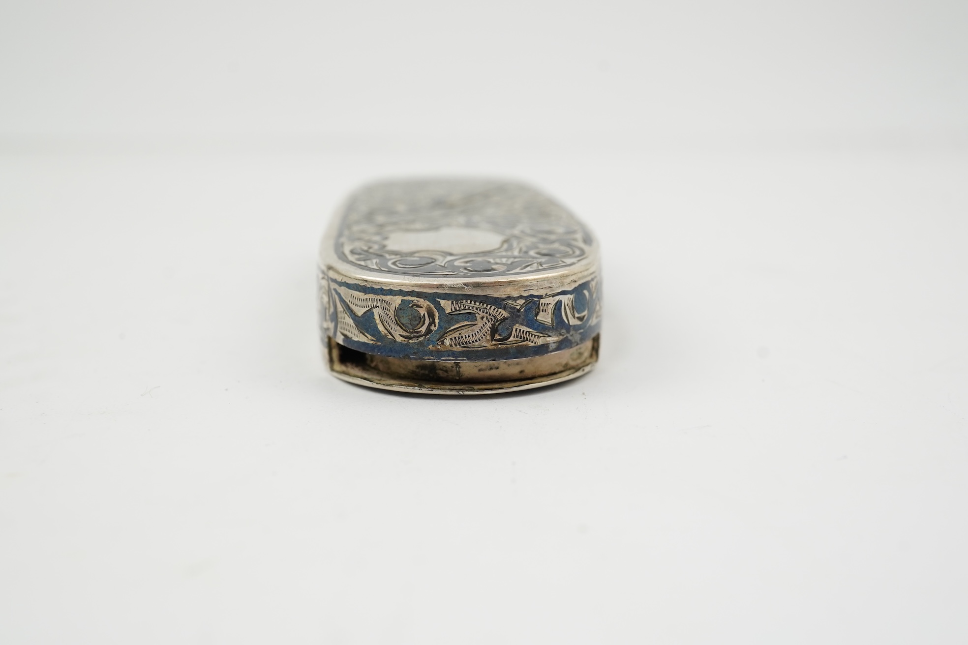 A 19th century Russian silver and niello coin case